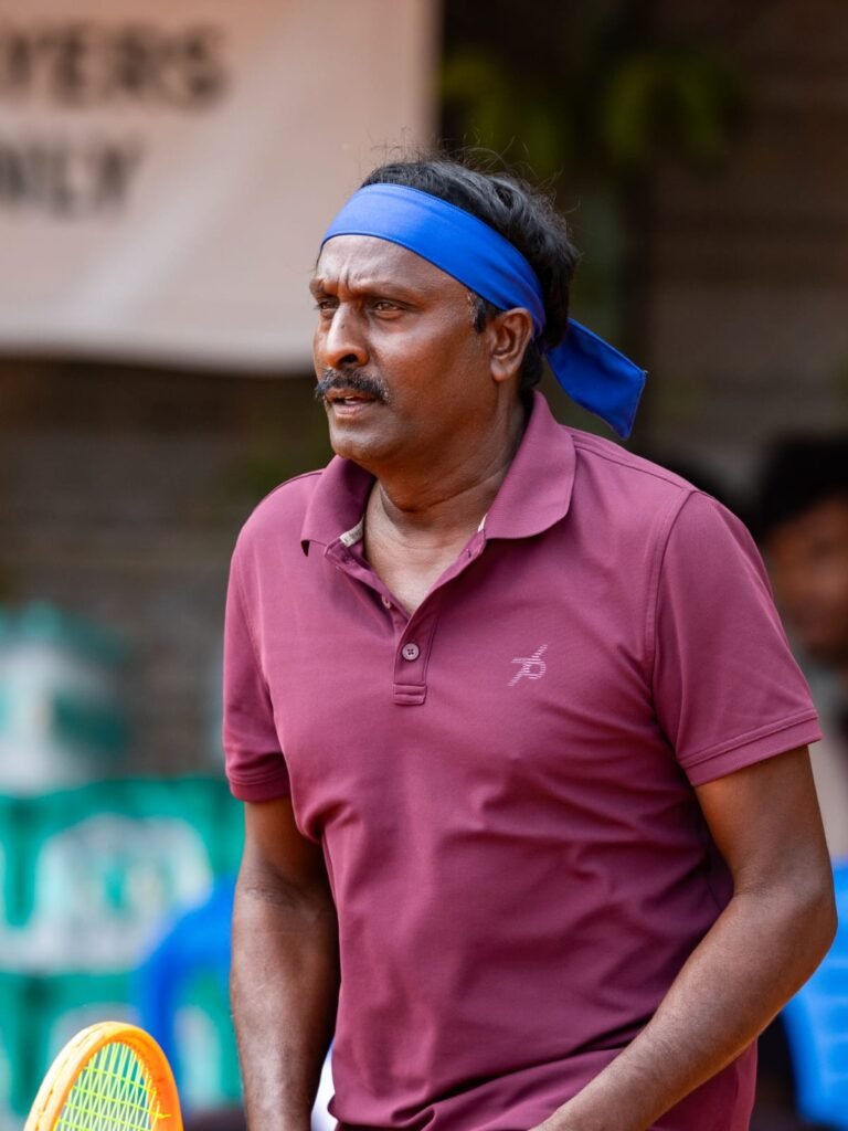 Player on court at True Bounce Tennis Academy, Bengaluru